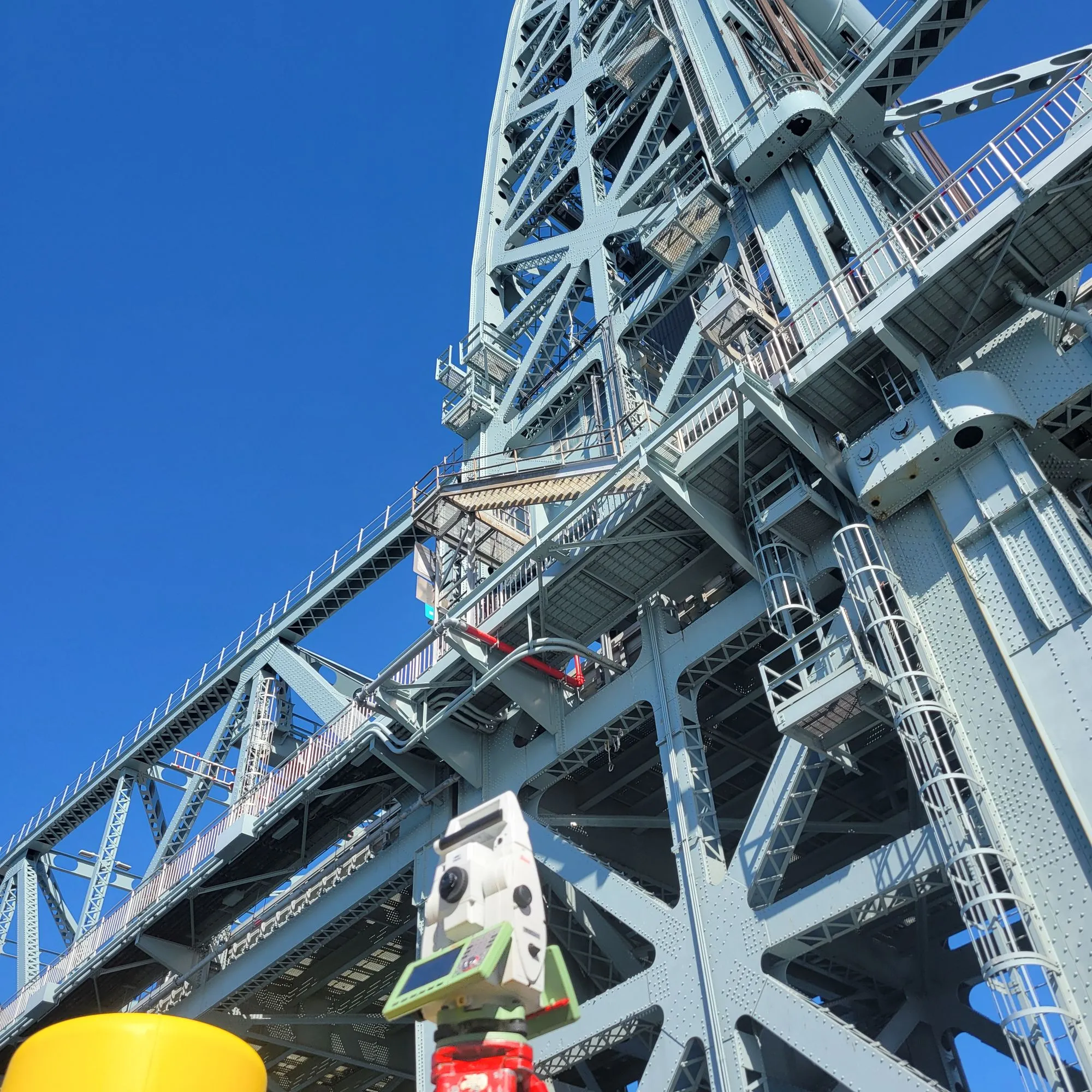Electronic tolling gantry spanning the approach roadway of an MTA bridge